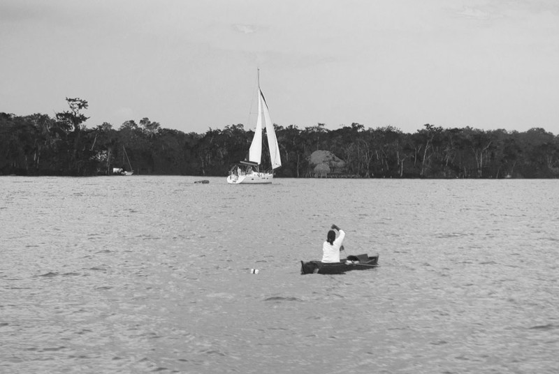 sailboat passing Guatemalan fisher 1