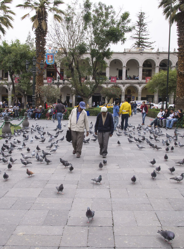 men walking Plaza de Armas Arequipa