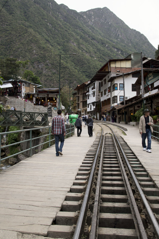 old train tracks running through Aguas Calientes