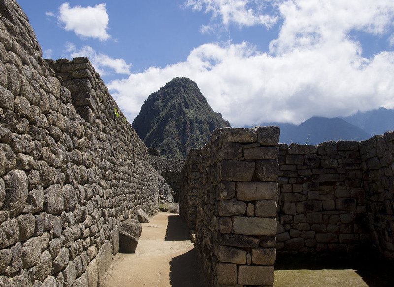 dirt path through stone walls  Machu Picchu