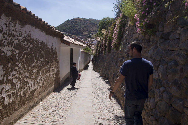 Matt walking down a back alley in Cusco