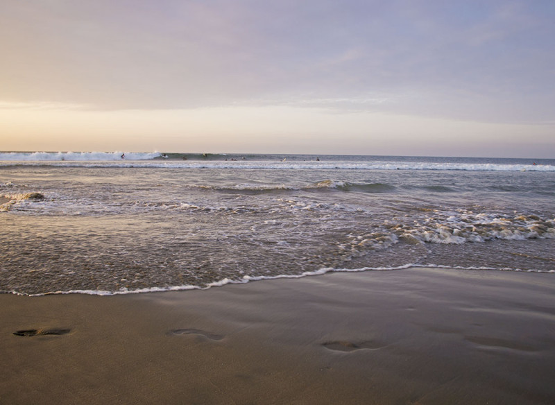 surfers at sunset, Mancora Peru