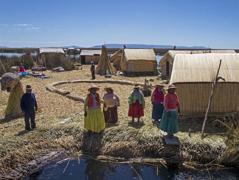 Los Uros native singing us goodbye