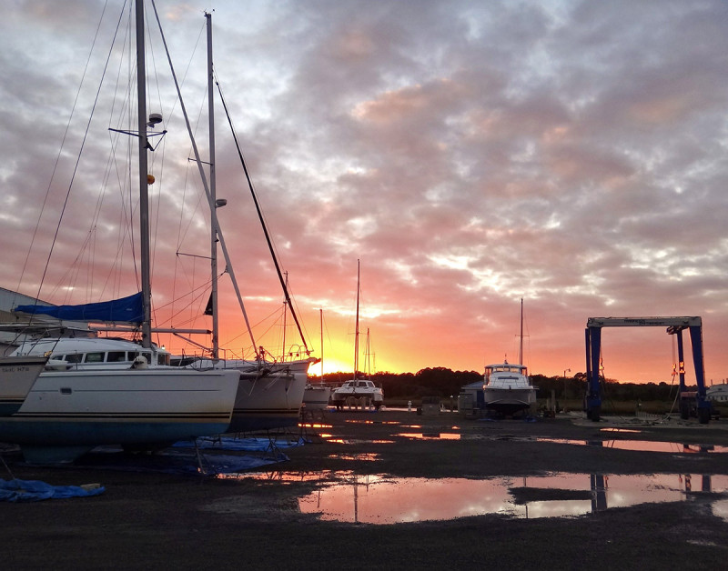 sunset in boat yard