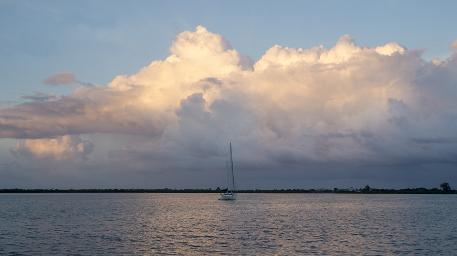 sunset over sailboat, Cay Caulker, Belize