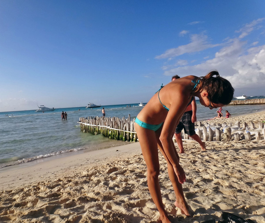 wiping off sand