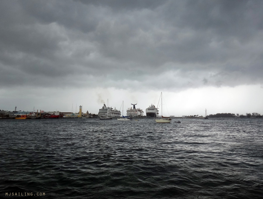 storm clouds over cruise ships