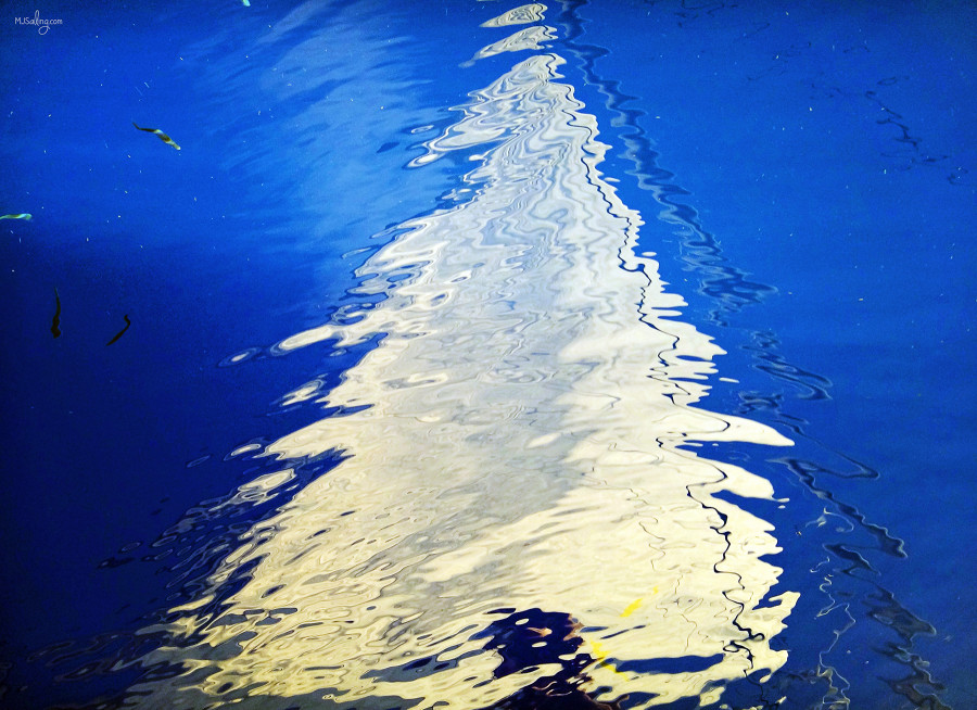 reflection of sail in water