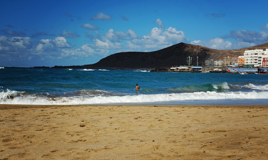 Alex surfing waves at Playa Canteras