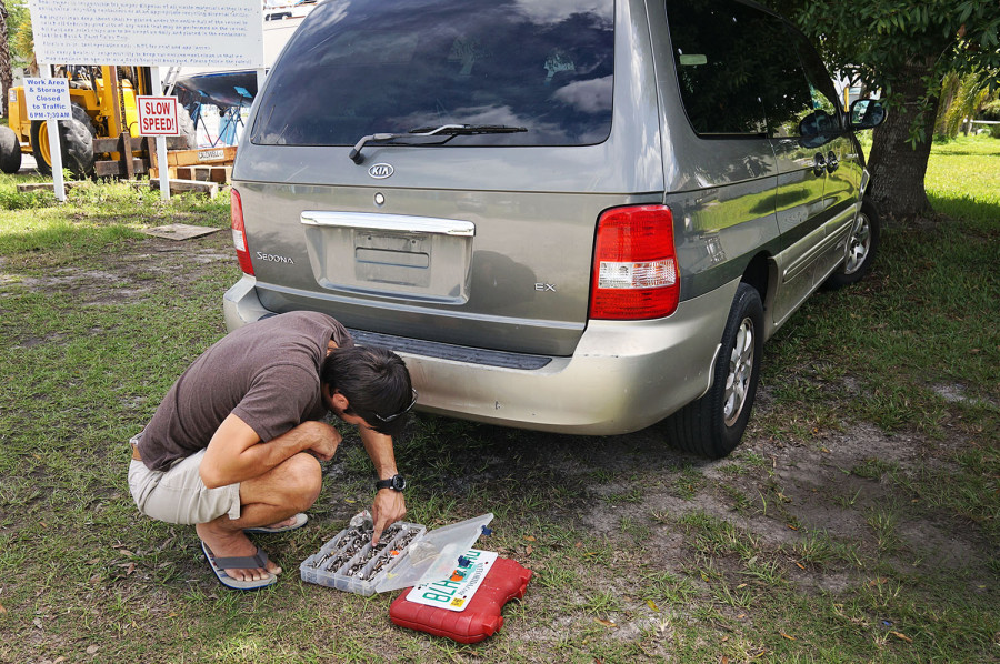 putting plates on our new vehicle