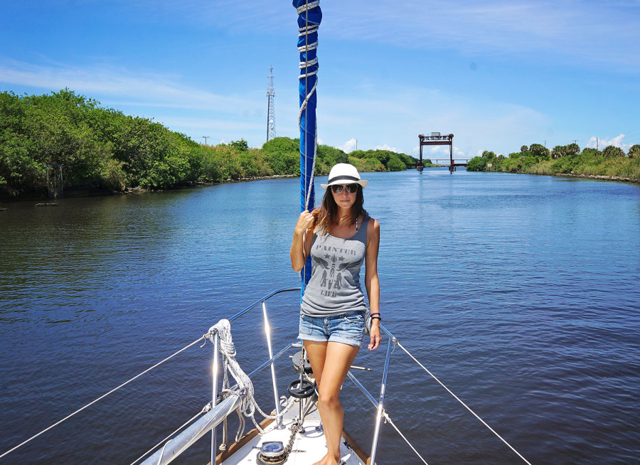 Jessica in front of railroad bridge