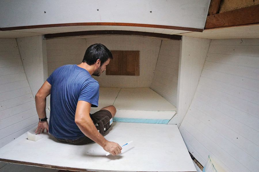 Matt installing v-berth foam