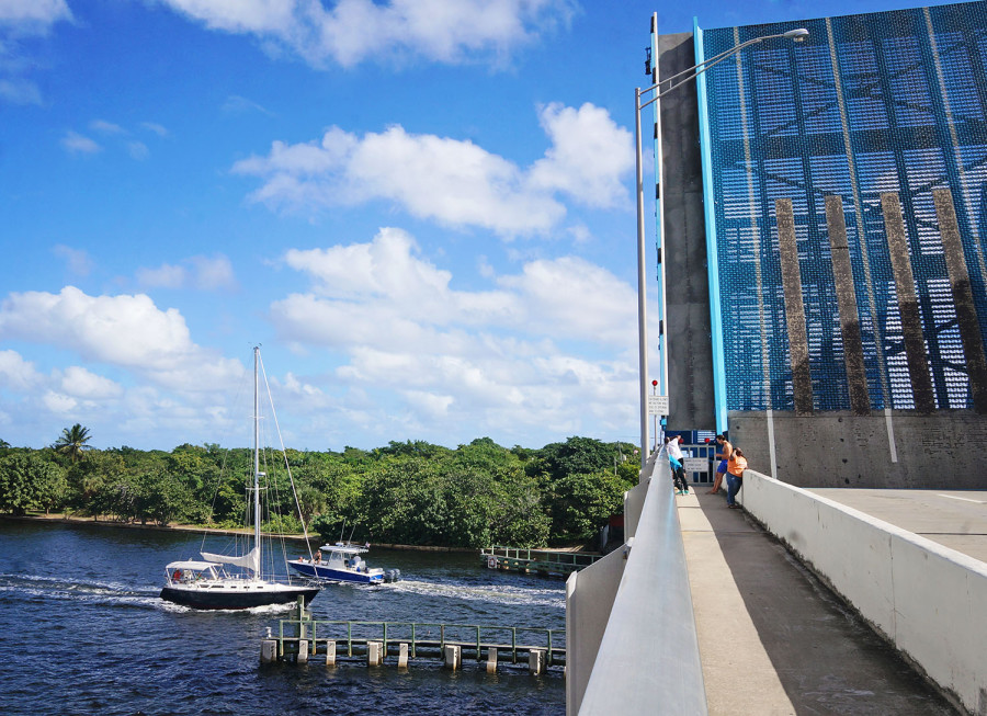 sail boats under draw bridge