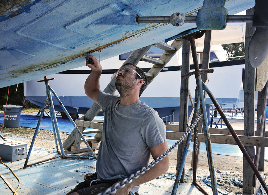 Matt scraping daggerboard slots