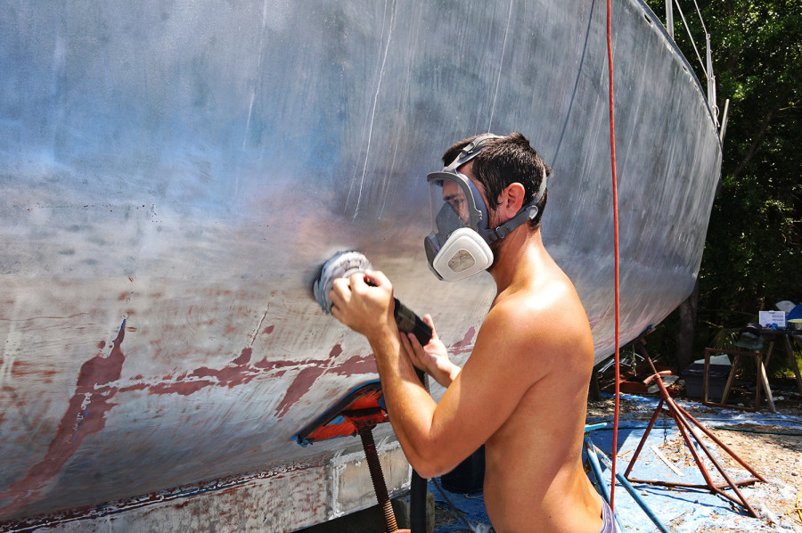 Matt sanding the hull